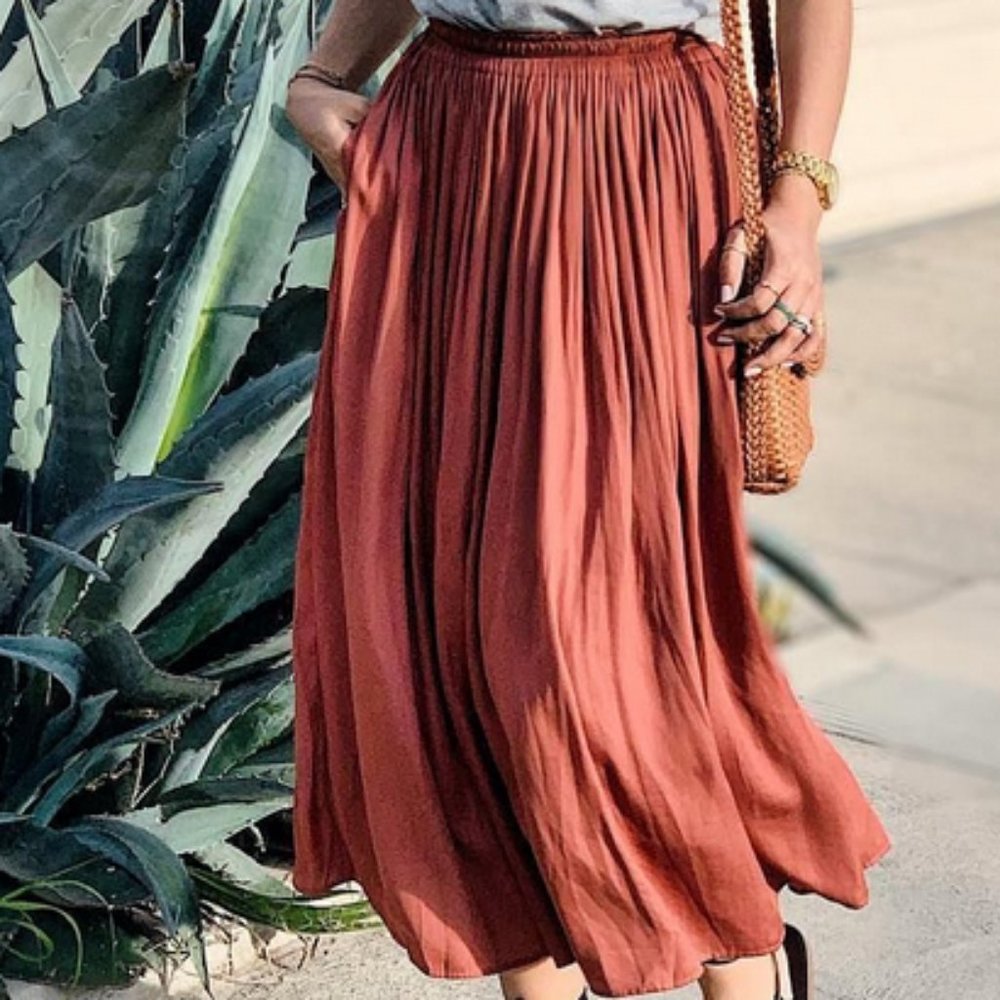 Uniqlo flowy, midi skirt - teracotta, size XS, only worn twice.